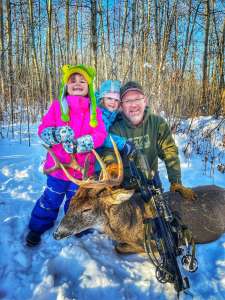 Family with deer.JPEG - Crossbow Magazine