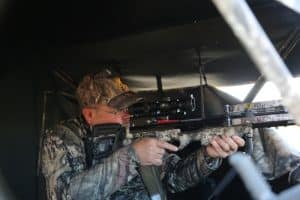 crossbow being used in a ground blind